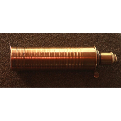 439 - Brass, tube powder flask by Bartram & Co. 