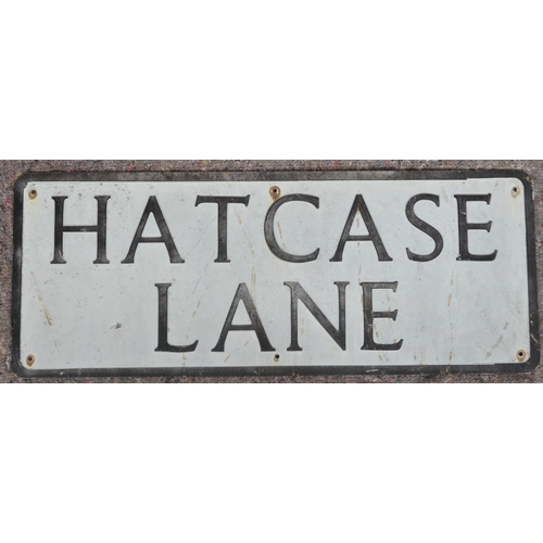 156 - Ex Pickering painted aluminium street sign 'Hatcase Lane', 68.5x27cm. From a collection of street si... 