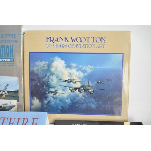 173 - Large collection of military and civilian aviation reference books and magazines, qty, 4 boxes