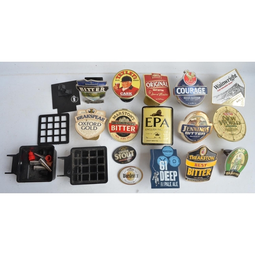 199A - Collection of breweriana to include beer taps, ashtrays, pumps, a Guinness mirror, dart sharpener, a... 