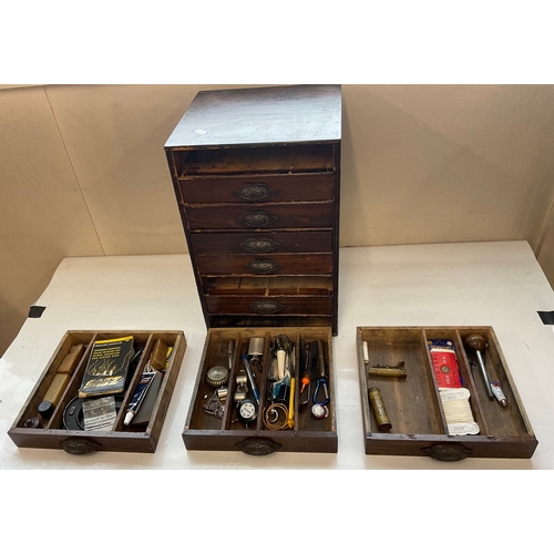 447A - 8 Drawer stationary cabinet with various contents, including fishing tackle, scales, micrometers, mi... 