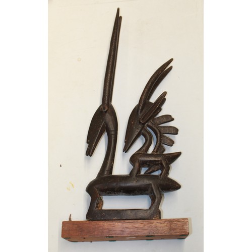 612 - Abstract wooden carving resembling an Antelope originating from the African continent