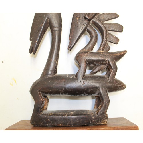 612 - Abstract wooden carving resembling an Antelope originating from the African continent