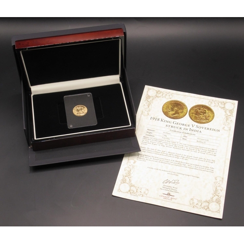 611 - George V 1918 Sovereign, struck in India, encapsulated in case, with box, COA from The London Mint O... 