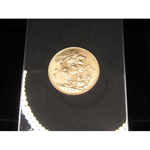 611 - George V 1918 Sovereign, struck in India, encapsulated in case, with box, COA from The London Mint O... 