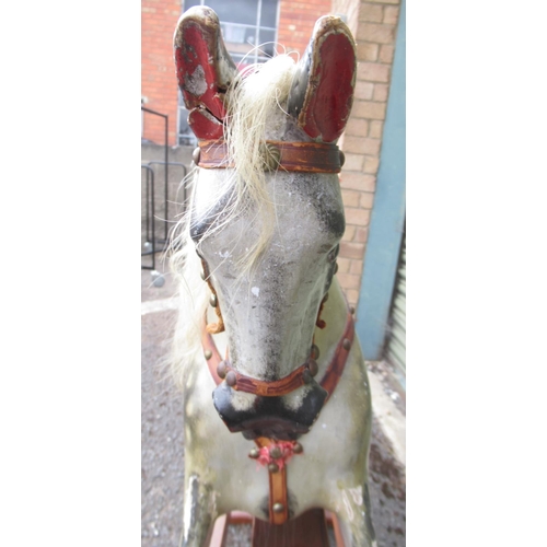 120 - F H Ayres: An Early 20th Century Dapple Grey Painted carved wood Rocking Horse, with brass-studded l... 