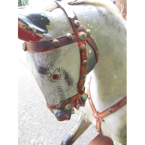 120 - F H Ayres: An Early 20th Century Dapple Grey Painted carved wood Rocking Horse, with brass-studded l... 