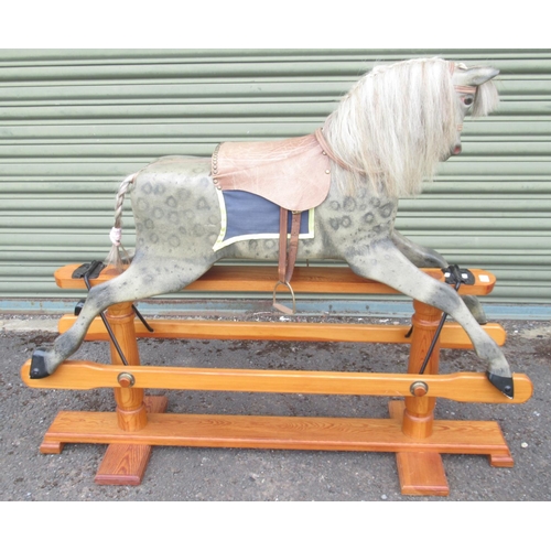 121 - A 20th Century Grey Painted Rocking Horse, with brass-studded leather saddle and under blanket, on a... 