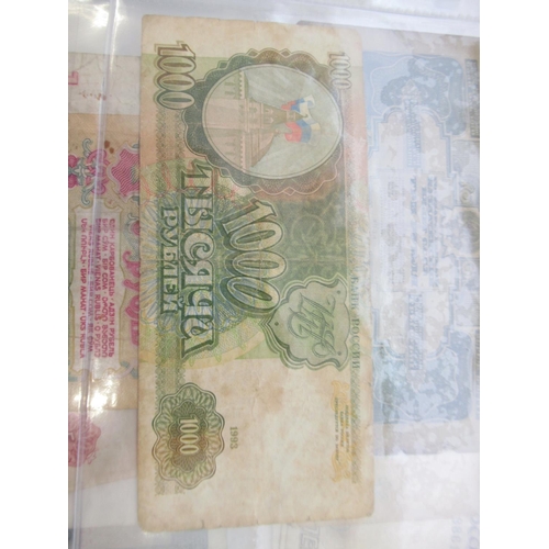 1190 - WITHDRAWN - Folder containing assorted collection of banknotes from Russia, Yugoslavia, etc. (approx... 