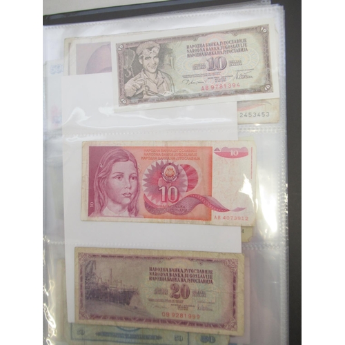 1190 - WITHDRAWN - Folder containing assorted collection of banknotes from Russia, Yugoslavia, etc. (approx... 