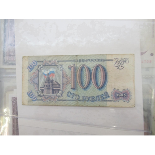 1190 - WITHDRAWN - Folder containing assorted collection of banknotes from Russia, Yugoslavia, etc. (approx... 