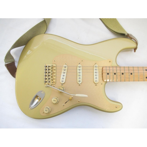 720 - Fender Stratocaster 50th Anniversary 2004 metallic gold electric guitar; serial no. MZ4114058, with ... 