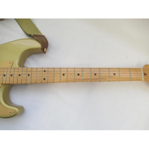 720 - Fender Stratocaster 50th Anniversary 2004 metallic gold electric guitar; serial no. MZ4114058, with ... 