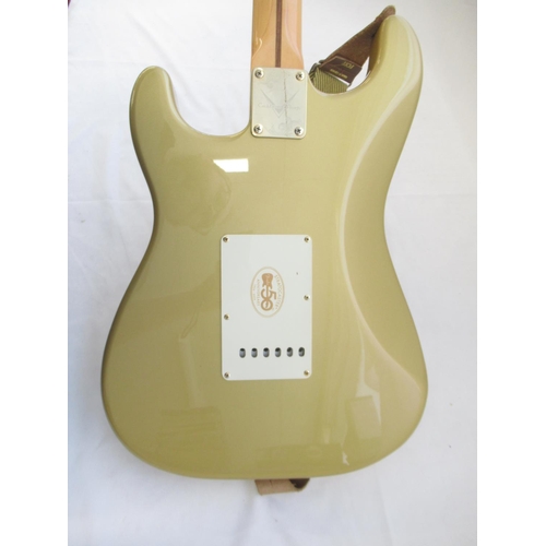 720 - Fender Stratocaster 50th Anniversary 2004 metallic gold electric guitar; serial no. MZ4114058, with ... 