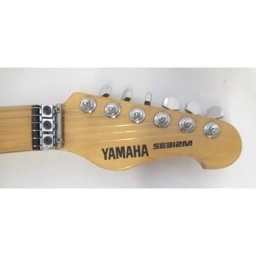 721 - Yamaha SE312M electric guitar, Made in Taiwan, Serial No.0017086, lacking back plate, a/f in a black... 