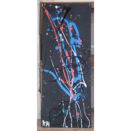 759 - Painted broken microphone montage on board, signed 'KH', 37cm x 94.5cm