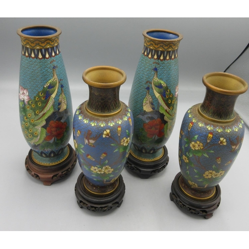 286 - Two pairs of late 20th century Chinese cloisonne vases, one pair decorated with peacocks on a blue g... 