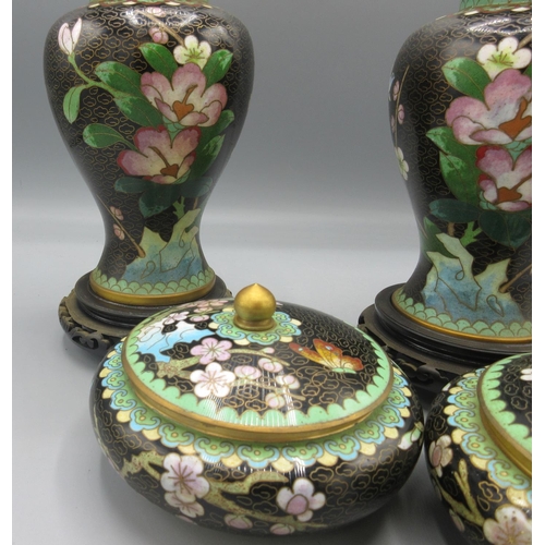 287 - Pair of late 20th century Chinese inverted baluster form urns and covers, decorated with pink flower... 