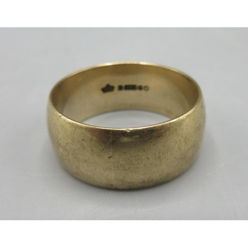 29 - 9ct yellow gold wedding band, stamped 375, size T1/2, 8.70g