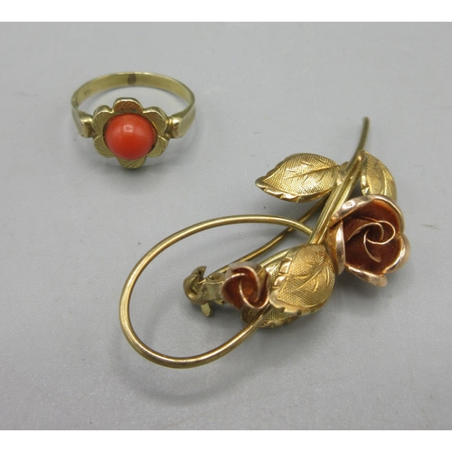 35 - 8ct yellow gold brooch in the form of a rose, and an 8ct yellow gold ring in the form of a flower wi... 