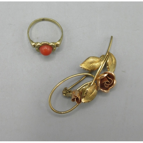 35 - 8ct yellow gold brooch in the form of a rose, and an 8ct yellow gold ring in the form of a flower wi... 