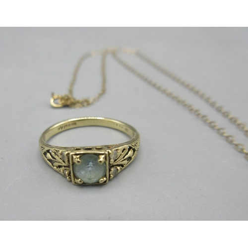 40 - 14ct yellow gold ring set with pale blue stone, on diamond chip shoulders, stamped 585, size L, a 14... 