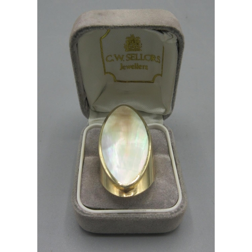 47 - 9ct yellow gold ring set with mother of pearl by C.W.Sellors, stamped 375, face length 3.7cm, size Q... 