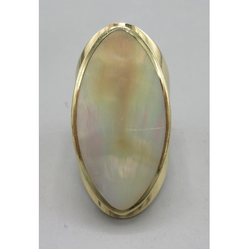 47 - 9ct yellow gold ring set with mother of pearl by C.W.Sellors, stamped 375, face length 3.7cm, size Q... 