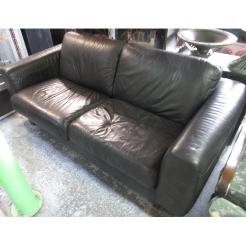 782 - Modern black leatherette 2 seater sofa, approx. W190cm H82cm D96cm and a modern rocking chair