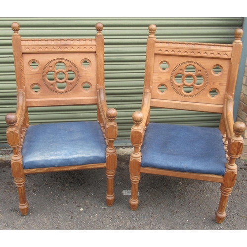 783 - Pair of pitch pine Ecclesiastical chairs with gothic pierced backs on turned supports, (2)