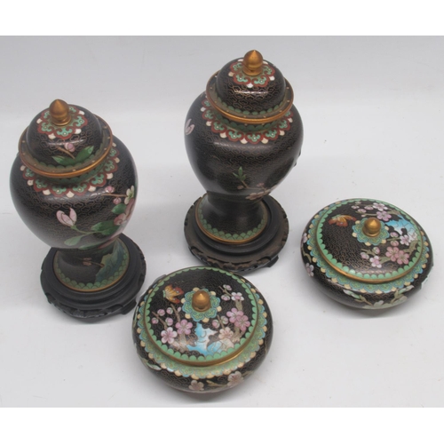 287 - Pair of late 20th century Chinese inverted baluster form urns and covers, decorated with pink flower... 