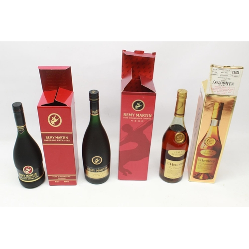 220 - Champagne cognac: two bottles Remy Martin 40% (1ltr & 70cl); and a 1ltr bottle Hennessy V.S.O.P. 40%... 