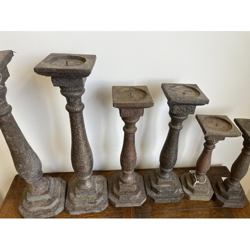 1117 - Three pairs of Indian wooden candlesticks with embossed pattern, max. H51cm (6)