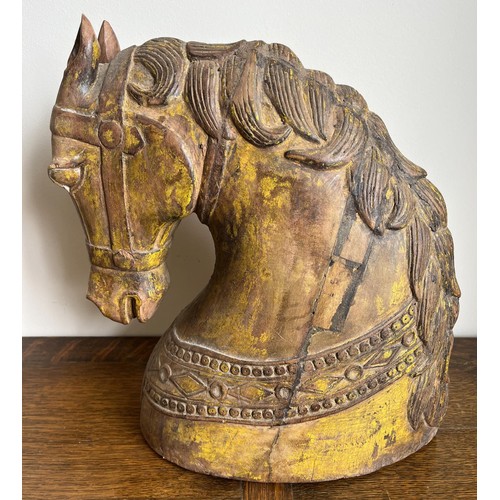 1128 - Indian yellow painted carved wood horse's head