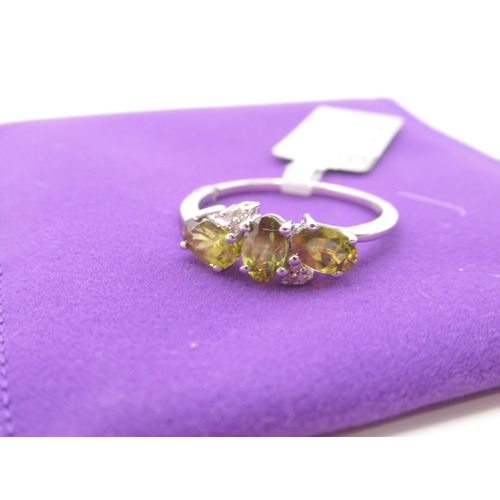 310 - Gemporia - Morafeno sphene and diamond 9k white gold ring, size R to S, metal weight 2.15g, with cer... 