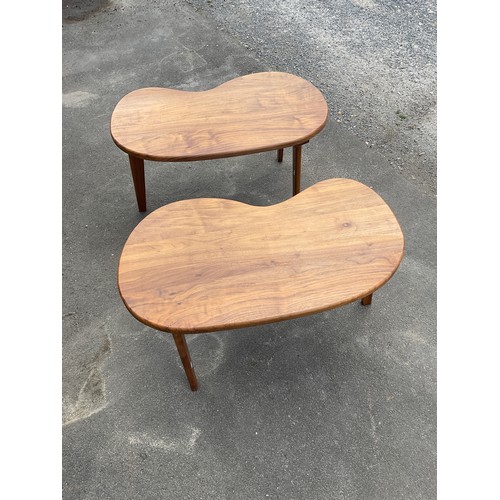 590 - Pair of American Black walnut kidney shaped coffee tables, on three tapered supports, W89cm D46cm H4... 