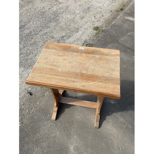 589 - Small 20th century oak Artist's table, adjustable top on solid end supports, W60cm