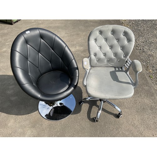 582 - Swivel office arm chair upholstered in grey, and a black upholstered swivel chair on chromed metal b... 