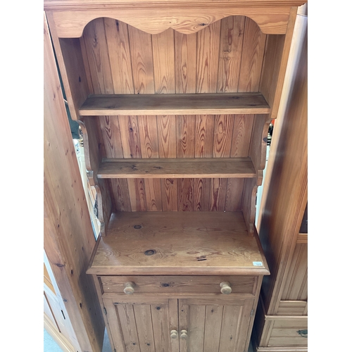 1270 - Small pine dresser, twin shelf back above drawer and two doors, W83cm D43cm H190cm