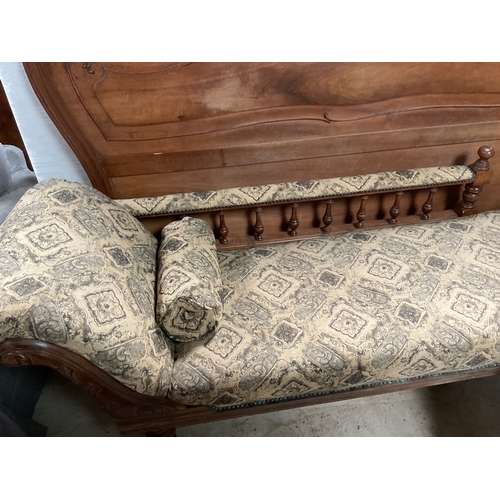 1272 - Victorian walnut chaise longue, with galleried back on turned supports, W180cm