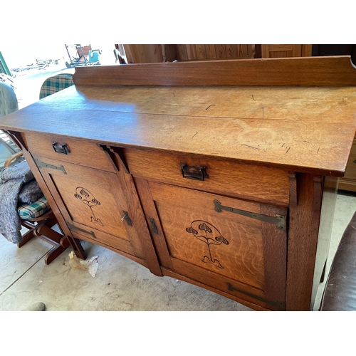 1279 - Early C20th Art Nouveau oak sideboard, low raised back and two frieze drawers over two panel doors c... 