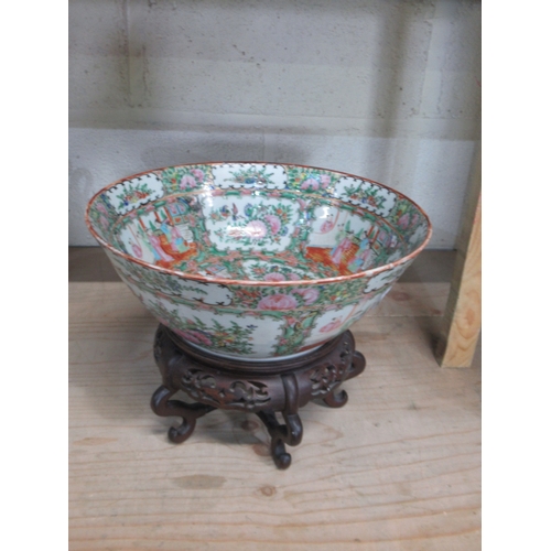 807 - Modern Chinese bowl famile vert decorated with figures and foliage, on hardwood stand, D30cm h23cm