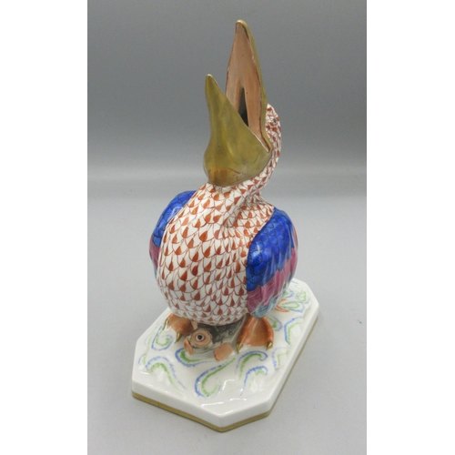 1158 - Herend hand painted porcelain model of a Pelican, standing with open beak on rectangular base with t... 