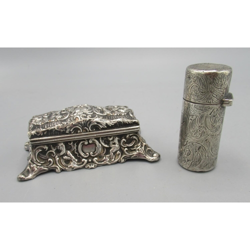 1067 - Victorian silver rectangular ring box, with hinged arched lid, all over repousse with scrolls and ca... 