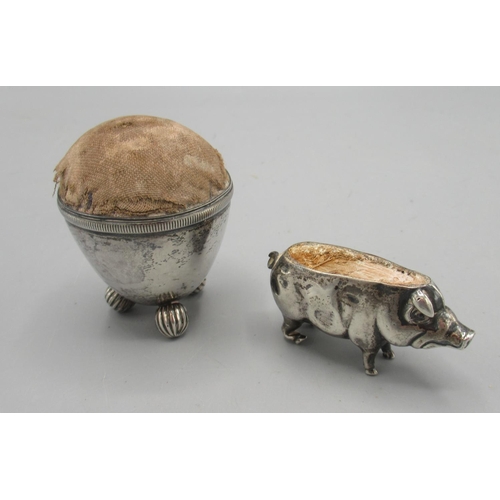 1071 - Edward V11 silver pig pin cushion, by Adie & Lovekin Ltd, Birmingham 1904, L4.5cm and a similar pin ... 