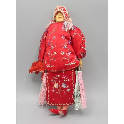 1246 - Chinese 'Door of Hope' bride doll c1930s, carved pearwood with hand-embroidered red silk costume, H2... 