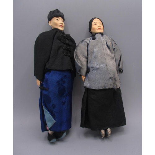 1244 - Chinese 'Door of Hope' dolls modelled as an elderly woman and man c1930s, carved pearwood with silk ... 