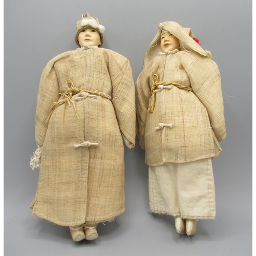 1245 - Two Chinese 'Door of Hope' dolls in mourning dress c1930s, carved pearwood with hemp and muslin cost... 