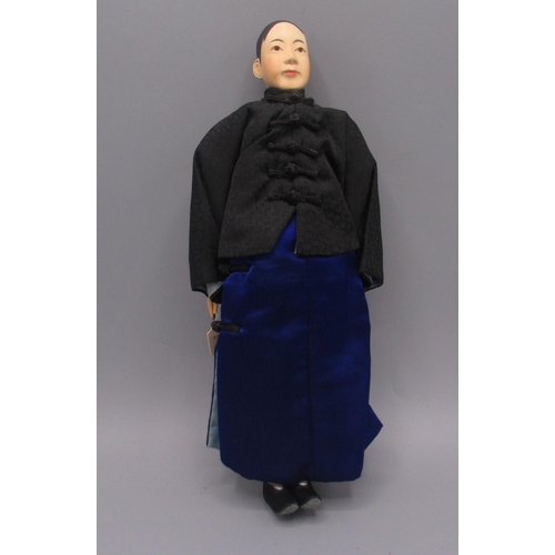 1256 - Chinese 'Door of Hope' male doll 1930s, carved pearwood with blue robe and black jacket and hat, H30... 