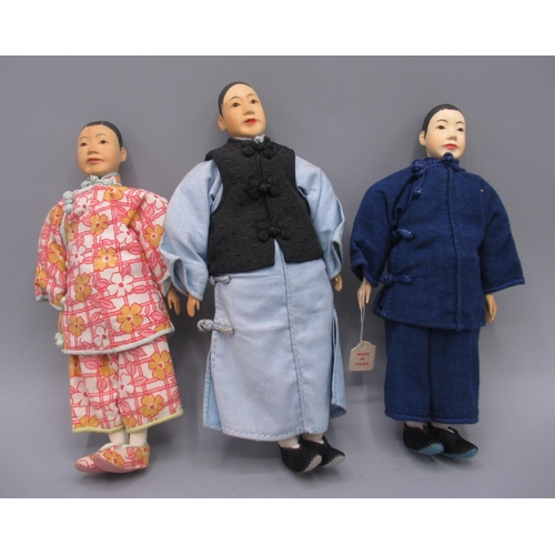 1251 - Three Chinese 'Door of Hope' dolls 1930s, carved pearwood, comprising two female dolls and one male,... 